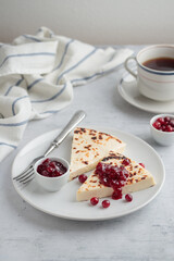 Leipajuusto - traditional Finnish baked cheese - with berries