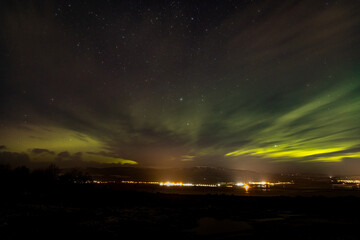 Aurora borealis above Alness and the Cromarty Firth in the north east highlands of Scotland near Inverness during winter