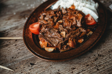 turkish kebab and yogurt with dark backround