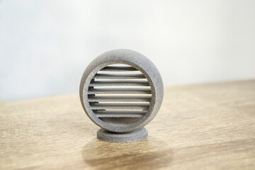 Gray abstract model object printed on 3d printer from powder close-up. 3D prototype created by 3d...
