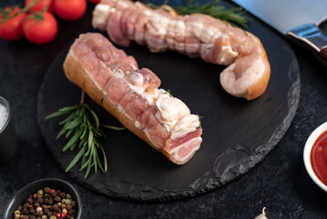 homemade lard with spices on a stone background