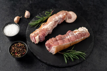 homemade lard with spices on a stone background