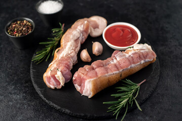 homemade lard with spices on a stone background