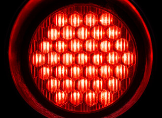 Bright round red light in the dark, object macro, detail, closeup, circle shape, nobody. Red alert,...