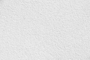 Fototapeta na wymiar Seamless texture of white cement wall a rough surface, with space for text, for a background...