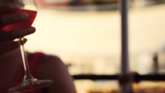 Venice, Veneto Region, Italy. August 2018. Savoring a spritz in Venice is a must if you visit the city. Towards late afternoon the bars are colored with full glasses of tasty and refreshing aperitifs.