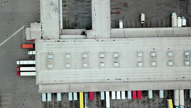 Aerial View Of Mail Delivery Terminal, Aerial View Of Cargo Terminal Of The Postal Service, Truck On The Industrial Warehouse, Distribution Warehouse With Trucks Awaiting Loading 