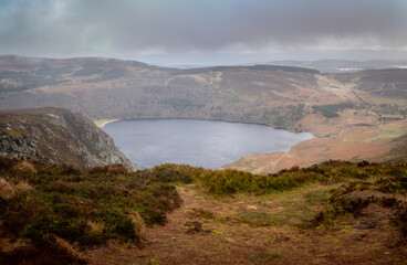 Guinness Lake, Lough Tay - panoramic view from  Luggala Vista over Wicklow Mountains, selective focus