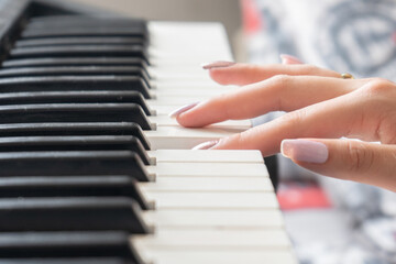 Fototapeta premium HANDS PLAYING PIANO
