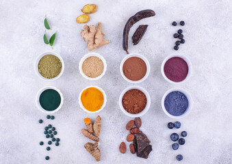 Various healthy superfoods powder assortment