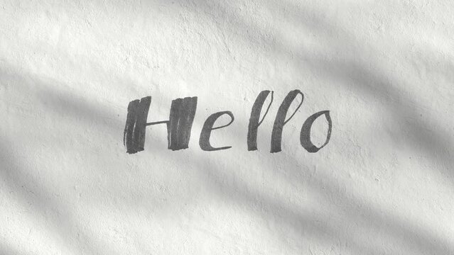 Hello handwriting text written on a white concrete wall on a sunny day. Greeting message and welcome quote. Moving shadow of trees. Modern design. Seamless background, animation loop stock video.