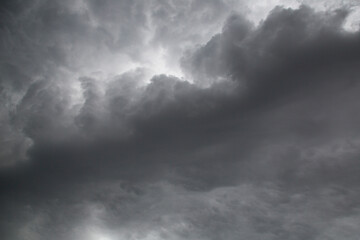 Dark strorm clouds during a thunderstorm in UK. Nature weather background.