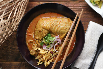 Northern Thai Style Curried Noodle Soup with Chicken or what we call in thai 