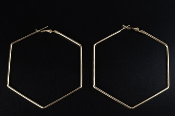 Jewelry earrings and costume jewelry on a black background