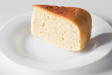 homemade pie on plate on white table