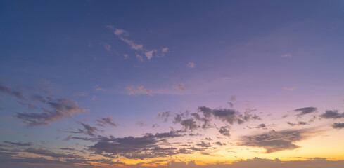 Sunset sky. Abstract nature background. Dramatic blue with orange colorful clouds in twilight time.