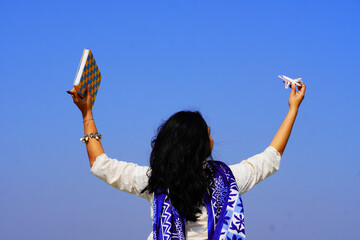 Happy smiling student girl with at outdoor shoot