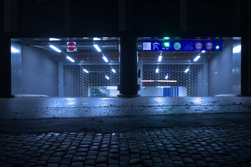 Entrance to the parking garage in Berlin at night. 