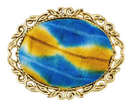 brass brooch with batik hand-painted silk insert