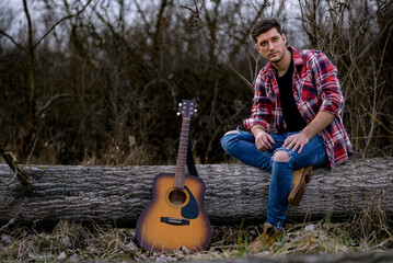 Man and classical acoustic guitar