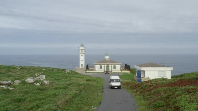 Drone aerial view of a camper van in Cape Tourinan in Galicia, Spain
