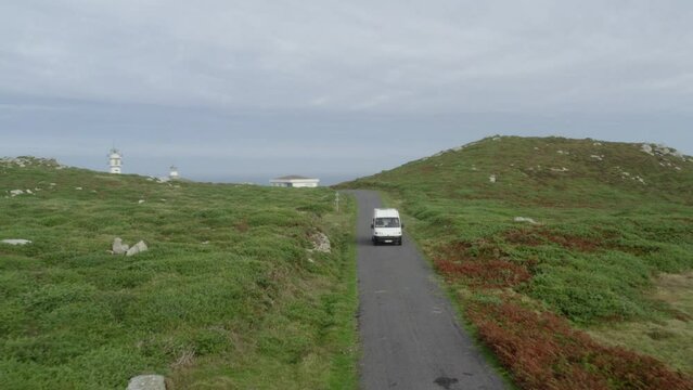Drone aerial view of a camper van in Cape Tourinan in Galicia, Spain
