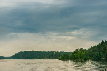 North Karelia lake, Russian wild nature. Forest growing on the stones