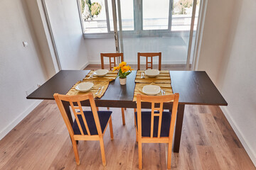 the living room, with its sofa, chairs, table of a house in Spain