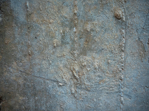 imagen textura pared de cemento con grumos y marcas 