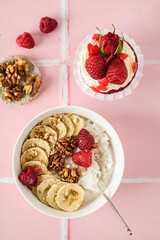 rice porridge with banana and raspberries