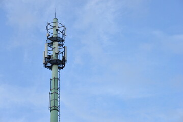 Fototapeta na wymiar Mast with communication antennas.