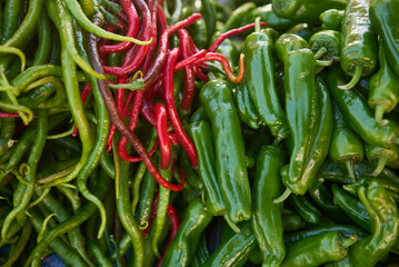 Full Frame Shot Of Green and Red Chili Peppers.
