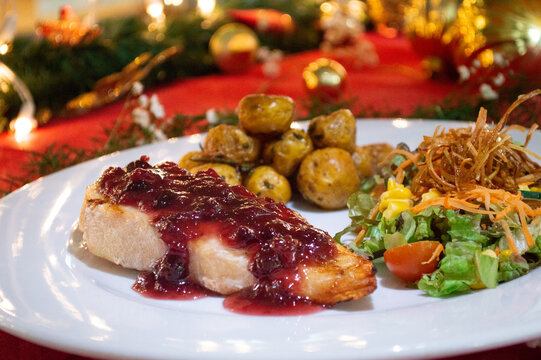 christmas dinner with chicken, potatoes and salad