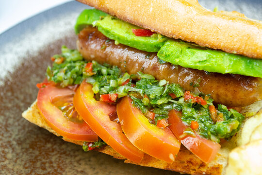 argentina's sandwich traditional with chorizo and chimichurri