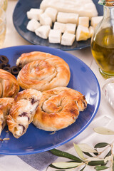 Pastry swirls with cheese and olive filling.
