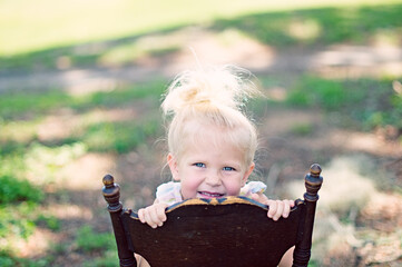 little child playing in the garden