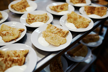 rustic pancakes with sour cream and jam