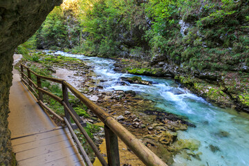 Pathway through Vintgar Gorge, Radnova River crosses this majestic Gorge, Slovenia