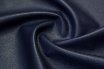 blue artificial leather with waves and folds on PVC base