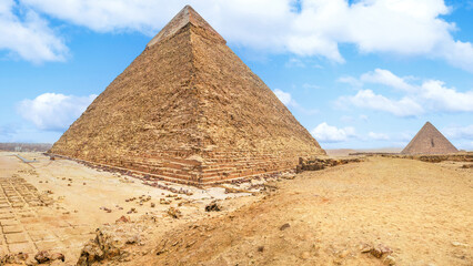 Fototapeta premium The Pyramid of Khafre is the second-tallest and second-largest of the 3 Ancient Egyptian Pyramids of Giza. 