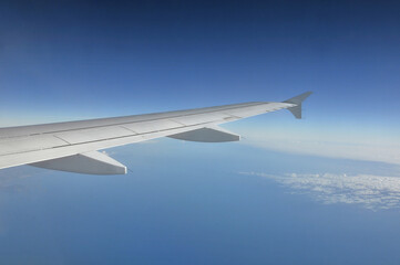 Fototapeta na wymiar Airplane's wing during flight