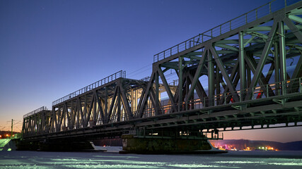 Train movement across the Railway bridge in Voronezh in winter