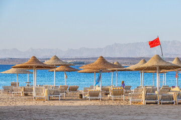  Hurghada, Egypt. .Swimming pool and accommodation at tropical resort. Buildings, swimming pools and a recreation area by the red sea.