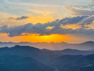 Colorful sunset on top of Albanian mountains. Holidays concept.