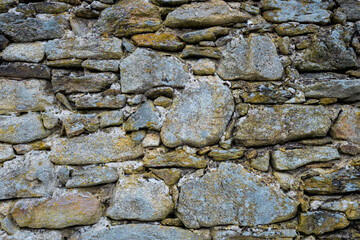 Stone wall. Outdoor background natural stone