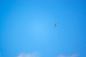 British army AgustaWestland AW159 Wildcat AH1 helicopter flying over Salisbury Plain (SPTA) UK clear blue sky