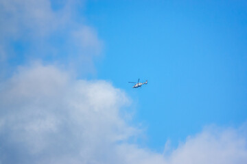 Fototapeta na wymiar British army AgustaWestland AW159 Wildcat AH1 helicopter flying over Salisbury Plain (SPTA) UK clear blue sky