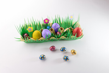 simple craft from paper and decorated egg holder, DIY instructions, recycling concept