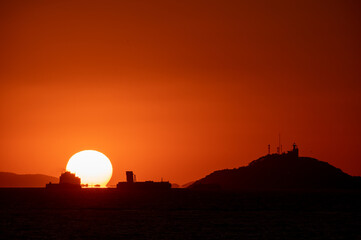 Fototapeta na wymiar Sunset view from an island in the sea 