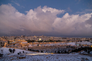 aerial view of jerusalem with snow and dome of the rock